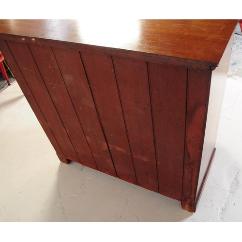 1050 - An early 20th century Edwardian walnut and satinwood chest of drawers. Rectangular form with flared ... 