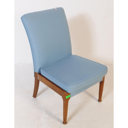 550 - Parker Knoll - A mid 20th century easy low bedroom chair with matching footstool / rest. Cushioned r... 