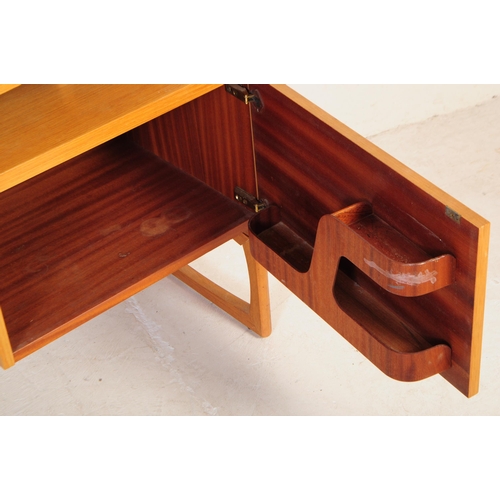 557 - G Plan - A mid 20th century G-Plan E-Gomme teak Quadrille dressing table in the manner of R. K. Benn... 