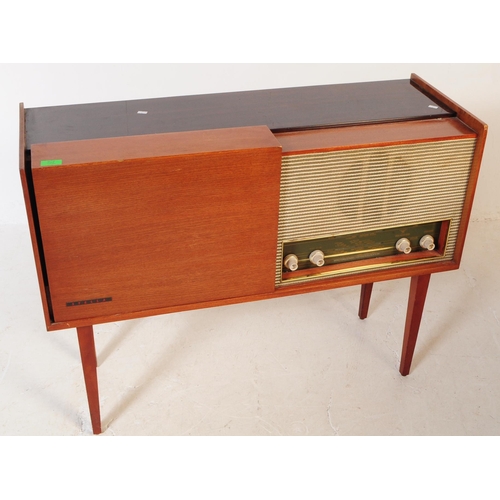 578 - A retro mid 20th century teak radiogram / stereogram. Rectangular form with smoked plastic top, radi... 