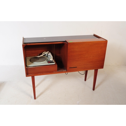 578 - A retro mid 20th century teak radiogram / stereogram. Rectangular form with smoked plastic top, radi... 