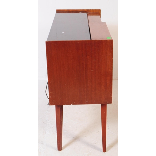 578 - A retro mid 20th century teak radiogram / stereogram. Rectangular form with smoked plastic top, radi... 