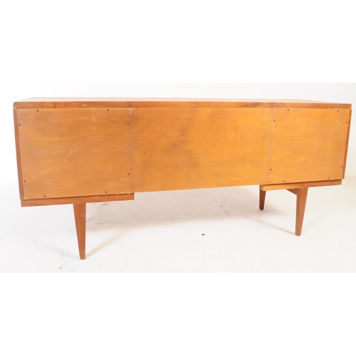 583 - Beithcraft Furniture - A mid 20th century teak writing office / school desk table. Rectangular form ... 