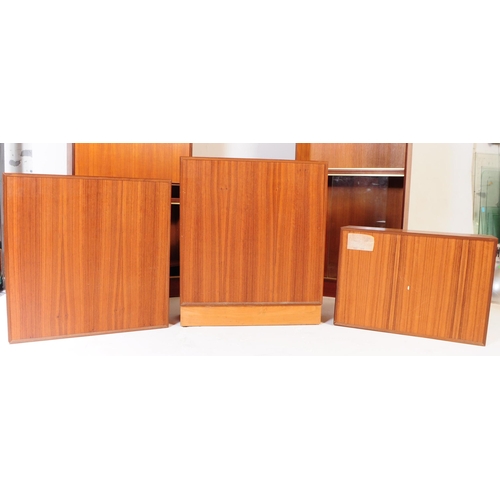 585 - Minty Furniture - A retro mid 20th century teak assortment / modular system of book cases / cabinet.... 