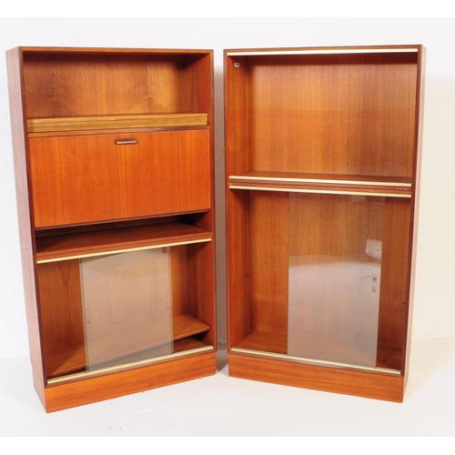 585 - Minty Furniture - A retro mid 20th century teak assortment / modular system of book cases / cabinet.... 