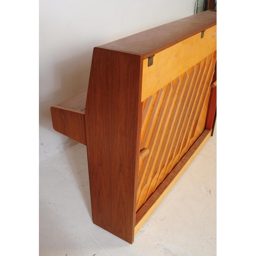 590 - John Broadwood & Sons - A mid 20th century John Broadwood & Sons London teak cased upright piano. Th... 