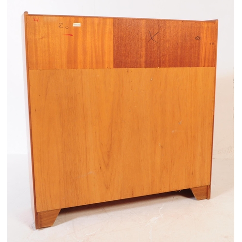 593 - Nathan - A retro mid 20th century circa. 1970's Nathan teak bookcase cabinet having a shelf over two... 