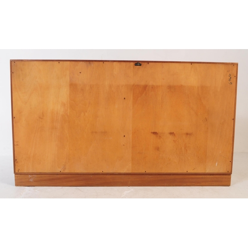 603 - Inglesants - A retro mid 20th century teak bookcase display cabinet. Rectangular form with double, t... 