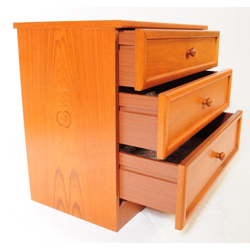 604 - G-Plan - two late 20th century Danish manner teak wood bedroom suite items. Comprising three draw ch... 