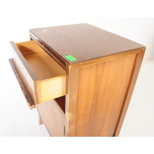 605 - An early to mid century oak wood side table together with an art deco walnut veneer bedside cabinet.... 