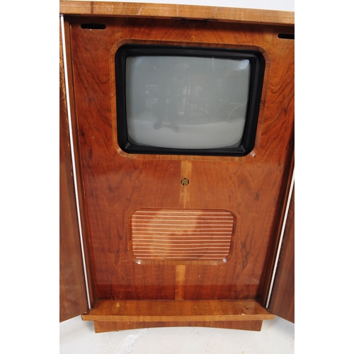 609 - An original mid century 1950's Pye television. Housed in its original mahogany wood twin door cabine... 