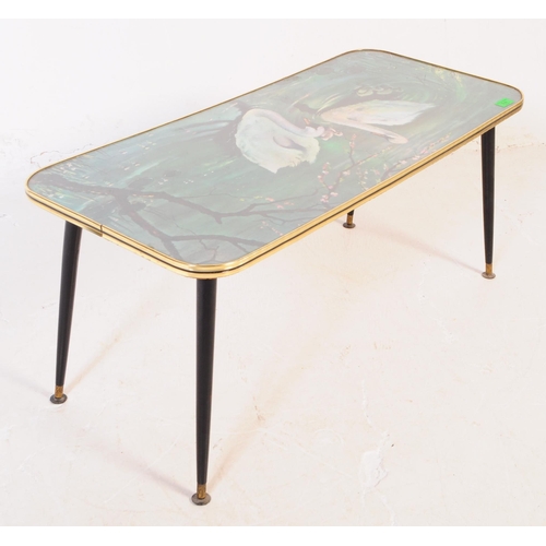 631 - A mid-century / retro 1960's glass top coffee table with dansette legs.  This vintage coffee table f... 