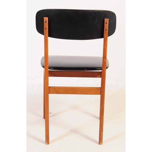 632 - A set of four mid 20th century circa 1960s teak Danish inspired dining chairs. The chairs each havin... 