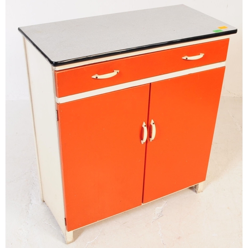 637 - A mid 20th century circa 1960s formica kitchen unit. The unit of rectangular form, with twin cupboar... 