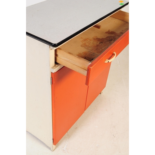 637 - A mid 20th century circa 1960s formica kitchen unit. The unit of rectangular form, with twin cupboar... 