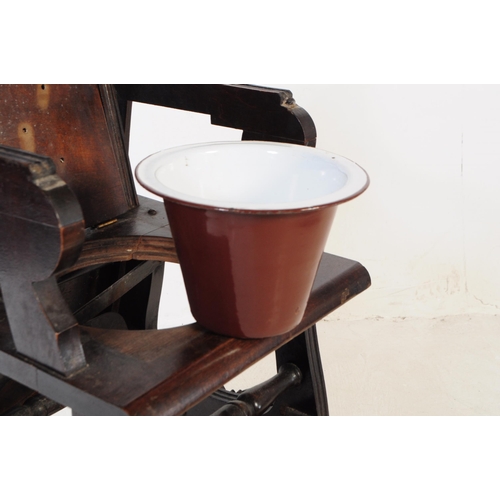 640 - A 19th century Victorian metamorphic wooden children's high chair. The chair having spindle backrest... 