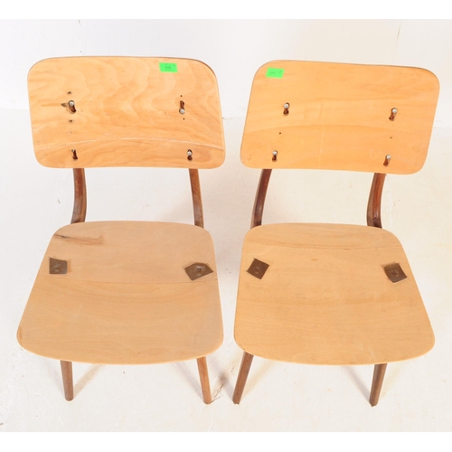 646 - Pair of vintage 20th century Danish manner teak dining chairs. With panel back rest and seat, curved... 