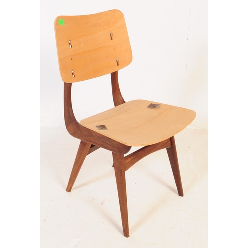 646 - Pair of vintage 20th century Danish manner teak dining chairs. With panel back rest and seat, curved... 