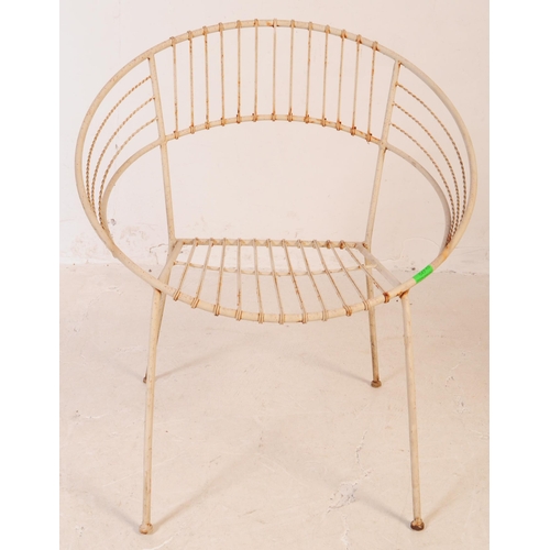 647 - A group of three vintage 20th century wire work satellite / egg chairs. Of round form with elbow res... 