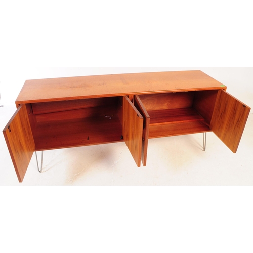 651 - G-Plan - A mid 20th century teak wood G Plan sideboard. The sideboard having two double door cupboar... 