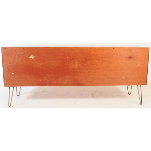 651 - G-Plan - A mid 20th century teak wood G Plan sideboard. The sideboard having two double door cupboar... 