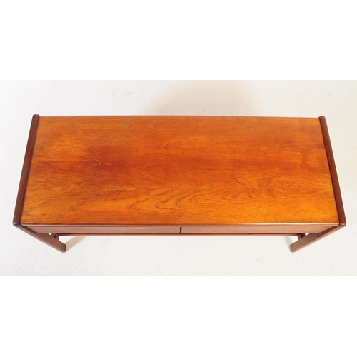 661 - Meredew - A mid 20th century Meredew teak wood coffee table. The table of rectangular form with roun... 