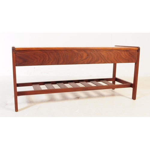 661 - Meredew - A mid 20th century Meredew teak wood coffee table. The table of rectangular form with roun... 