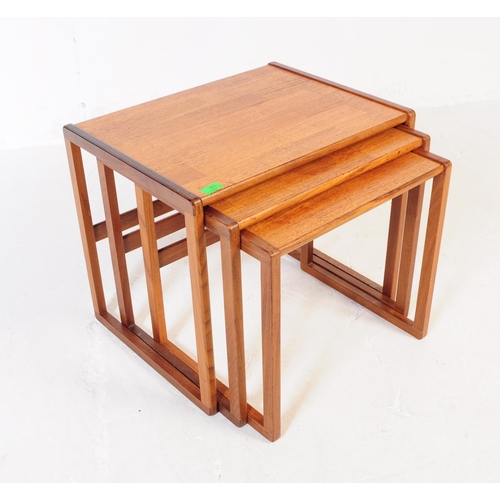 662 - G-Plan - A mid 20th century G Plan teak wood nest of tables. The tables raised on squared supports, ... 