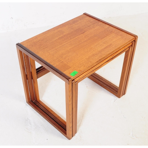 662 - G-Plan - A mid 20th century G Plan teak wood nest of tables. The tables raised on squared supports, ... 