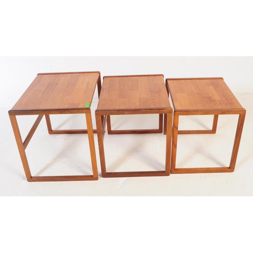 662 - G-Plan - A mid 20th century G Plan teak wood nest of tables. The tables raised on squared supports, ... 