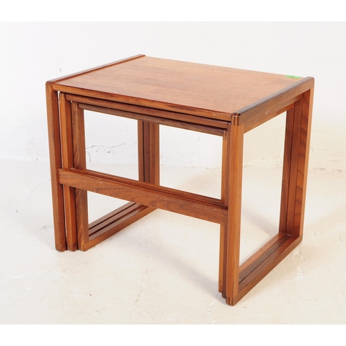 662 - G-Plan - A mid 20th century G Plan teak wood nest of tables. The tables raised on squared supports, ... 