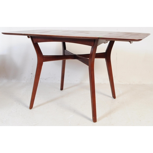 663 - G-Plan - A mid 20th century circa 1960s G Plan E Gomme Brandon range oak drop leaf dining table and ... 