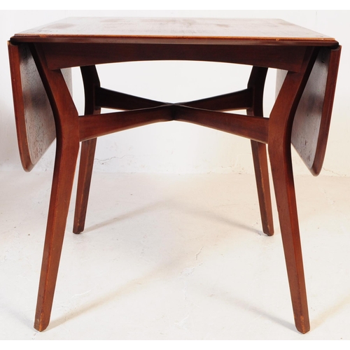 663 - G-Plan - A mid 20th century circa 1960s G Plan E Gomme Brandon range oak drop leaf dining table and ... 