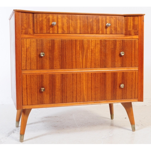 665 - Austinsuite - A mid 20th century circa. 1960's Austinsuite teak veneer chest of drawers. The bank of... 