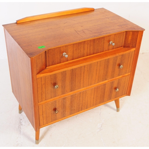 665 - Austinsuite - A mid 20th century circa. 1960's Austinsuite teak veneer chest of drawers. The bank of... 