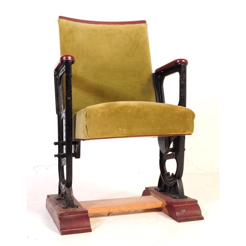 667 - A mid 20th century single cinema / theatre audience chair. The chair having a folding seat suspended... 