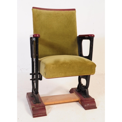 667 - A mid 20th century single cinema / theatre audience chair. The chair having a folding seat suspended... 