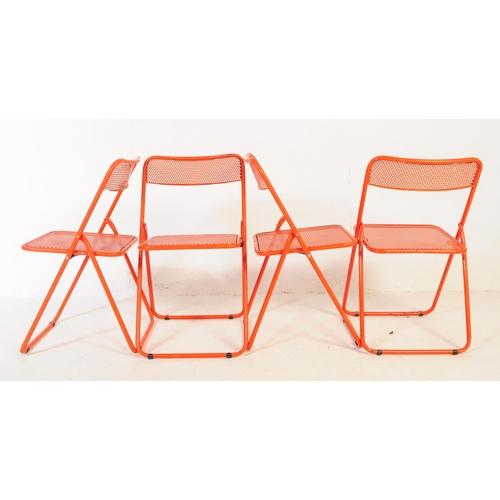 670 - A collection of four 20th century circa 1970s folding metal kitchen dining chairs. The chairs featur... 