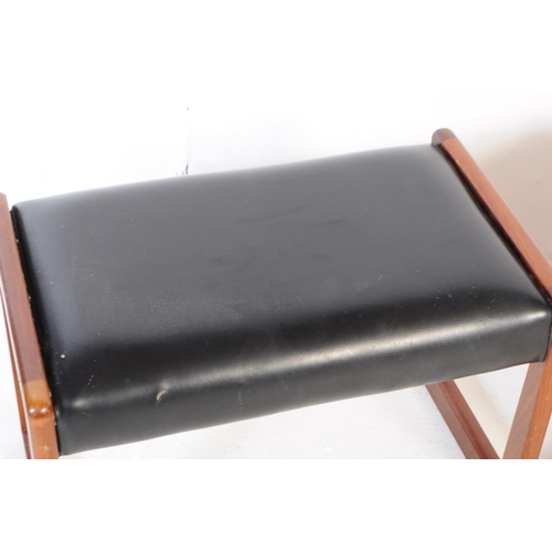 673 - Two mid 20th century retro footstools. Of rectangular form with cushioned black vinyl raised on wood... 