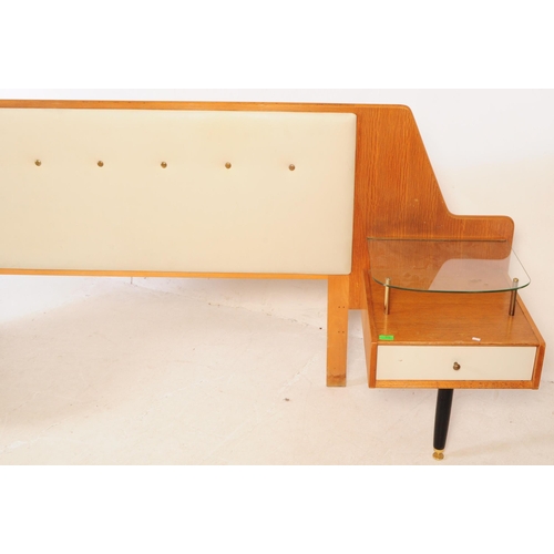 675 - Ernest Gomme for G-Plan - A retro mid 20th century teak double bed headboard. Having a raised centre... 