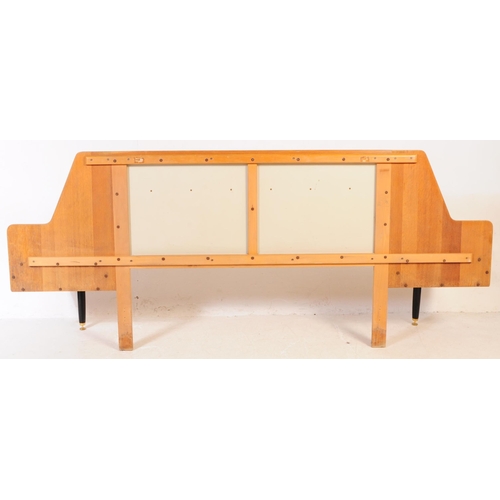 675 - Ernest Gomme for G-Plan - A retro mid 20th century teak double bed headboard. Having a raised centre... 