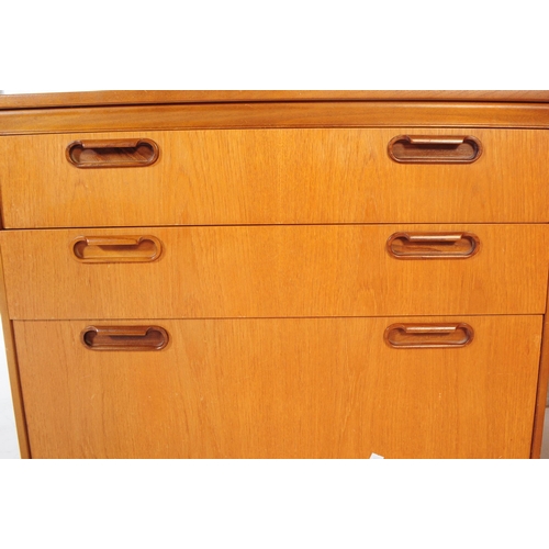 677 - William Lawrence - Two mid century teak beside chest of drawers. Rectangular form with bank of three... 