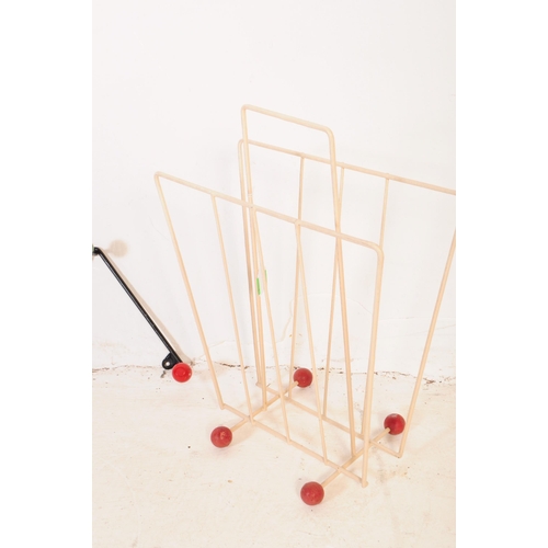 684 - A mid 20th century atomic bent wire coat rack and magazine stand. The coat rack having a bent zigzag... 