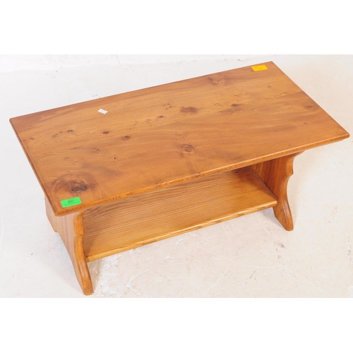 697 - A vintage later 20th century pine wood coffee / side / occasional table. Having rectangular top over... 