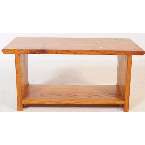 697 - A vintage later 20th century pine wood coffee / side / occasional table. Having rectangular top over... 