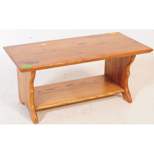 697 - A vintage later 20th century pine wood coffee / side / occasional table. Having rectangular top over... 