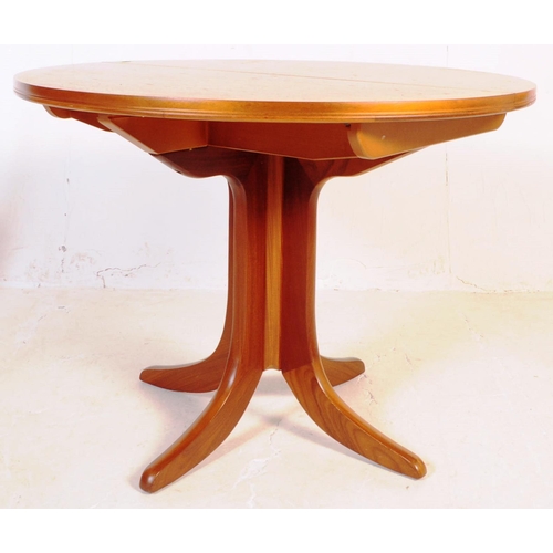 711 - Parker Knoll / G Plan - A mid 20th century teak Parker Knoll dining table together with six G Plan d... 