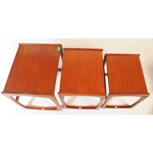 718 - G-Plan Furniture - A 1970's G-Plan Quadrille teak wood nest of tables. The tables of graduating form... 