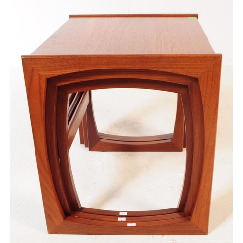 718 - G-Plan Furniture - A 1970's G-Plan Quadrille teak wood nest of tables. The tables of graduating form... 