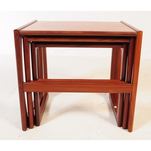 718 - G-Plan Furniture - A 1970's G-Plan Quadrille teak wood nest of tables. The tables of graduating form... 